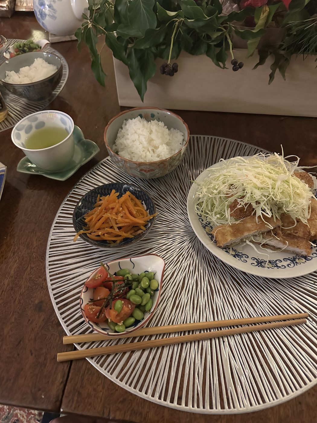 Pork katsu with shredded cabbage and Japanese sides