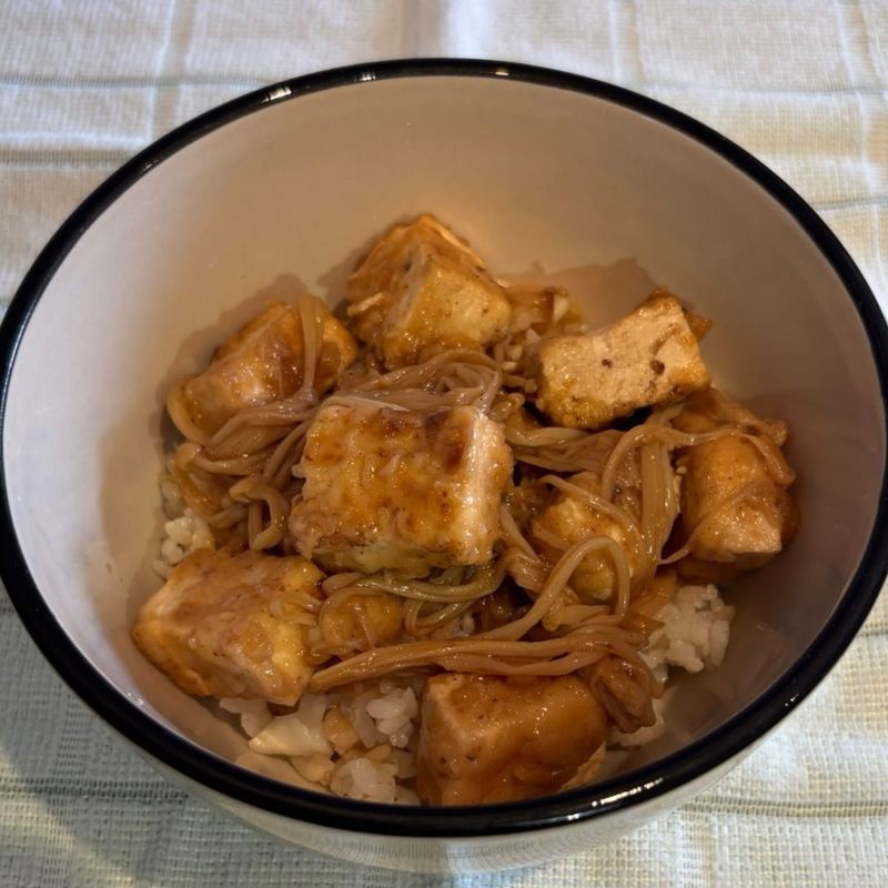 Agedashi tofu with enoki mushrooms in a bowl