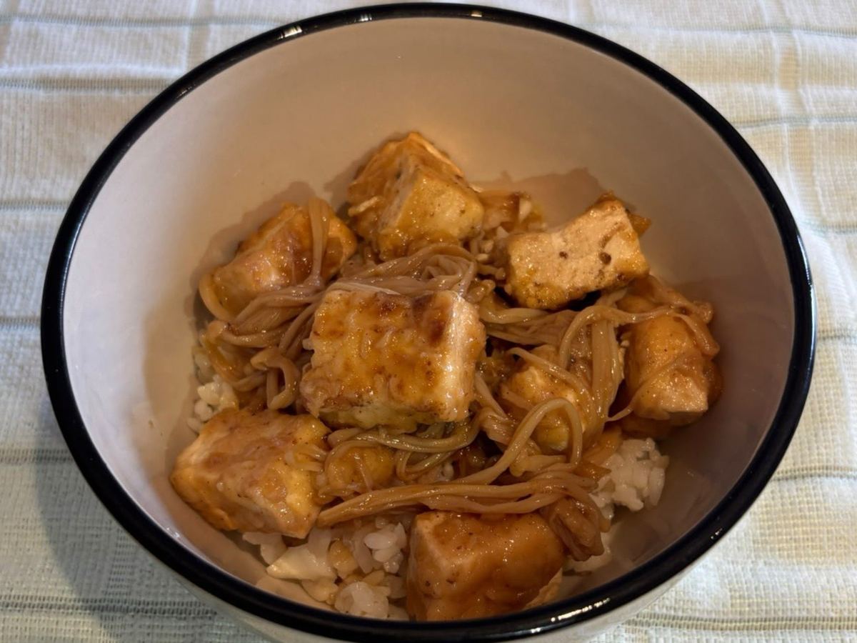 Agedashi tofu with enoki mushrooms in a bowl