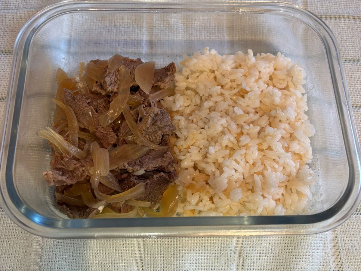 Gyudon beef and onion with rice in a meal prep container