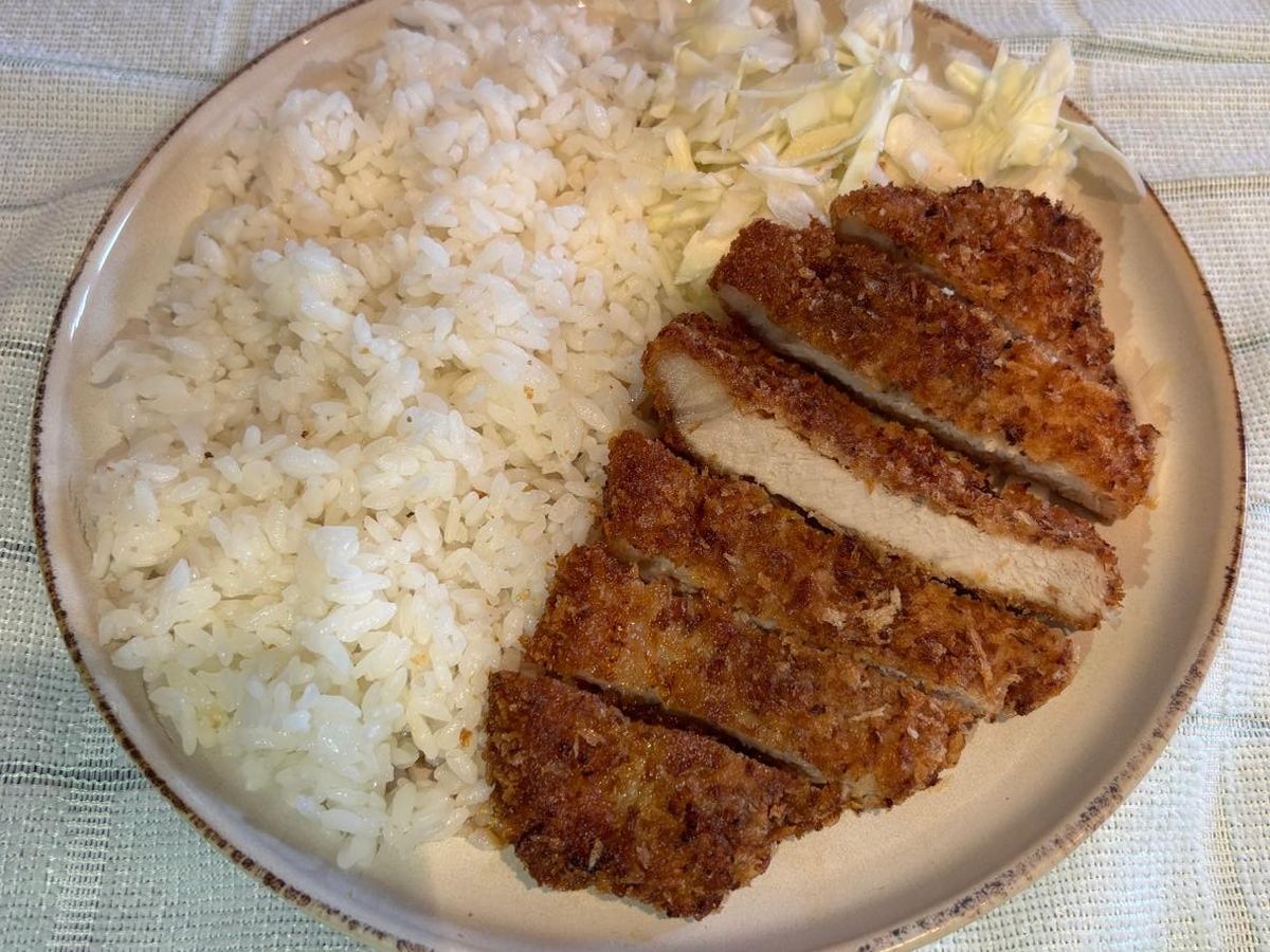 Sliced tonkatsu with rice and shredded cabbage