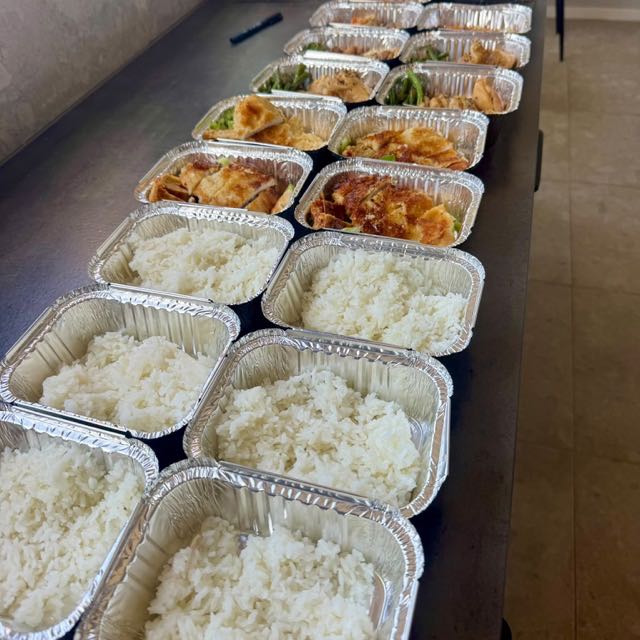 A full visit of Japanese meal prep portioned into trays by an oishee private chef in a London kitchen